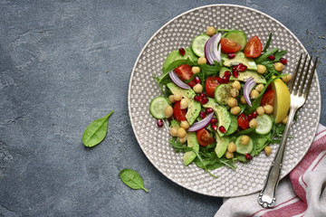 Vegetable salad with chickpea.Top view with copy space.