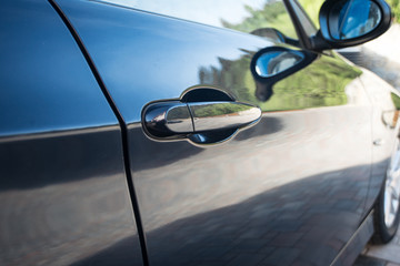 Shine bodywork of blue car