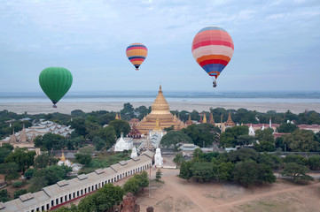 Hot air balloons flying over Bagan Archaeological zone, Mandalay division, Myanmar