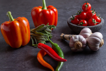 vegetable arrangement on dark surface
