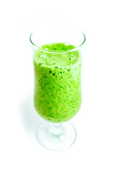 A glass of green organic smoothie drink, isolated on a white background. Healthy diet concept.
