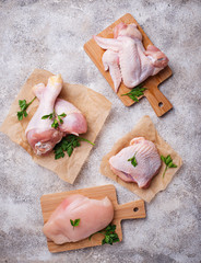Raw chicken meat fillet, thigh, wings and legs