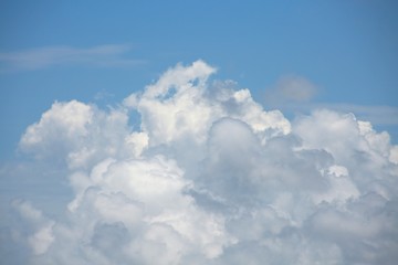Fluffy Billowy Cumulus Clouds in the Blue Summer Sky in Florida