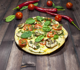 Traditional hot Italian mushroom pizza on a wooden table. Only taken out of the oven.