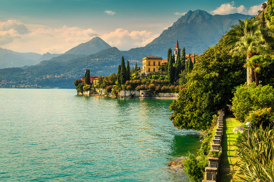 Ornamental garden and villa Monastero in background, lake Como, Varenna