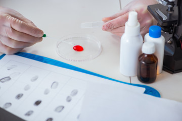 Drug synthesis lab experimentnig with pills