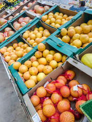 Fruit market with various colorful fresh fruits and vegetables