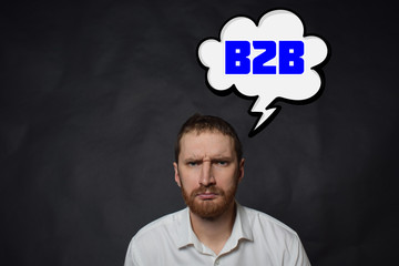 Above the businessman hangs a cloud with the inscription:B2B