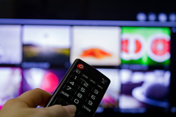 Watching TV and using remote controller