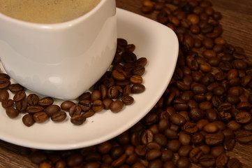 a cup of coffee on a saucer