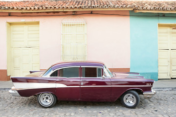 Old American car parked on the Trinidad street