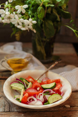 Vegetable salad from organic vegetables - healthy food (fresh vegetable set).  Food background