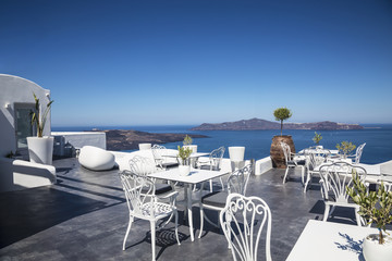 View of the Caldera from the terrace cafe, Fira, Santorini, Greece