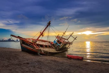 Acrylic prints Schip Wreck was left on the beach with the beautiful twilight sky.
