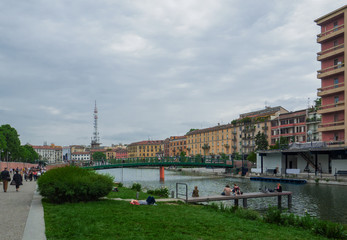 the picturesque Navigli district with its colorful houses overlooking the Darsena.Milan, Italy
