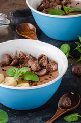 Chocolate pudding, banana and herbs in