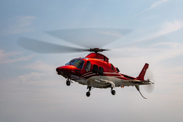 luxury helicopter while flying © Andrea Izzotti