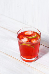 strawberry citrus lemonade on a white background, vertical