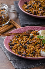 Granola baked in oven with nuts