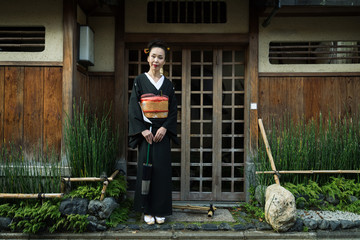 Asian woman with yukata walking in Kyoto, Japan