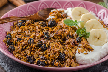 Granola baked in oven with nuts