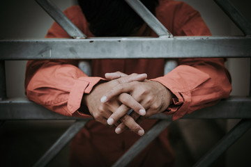 Hands of men desperate to catch the iron prison,prisoner concept,thailand people,Hope to be free,A...