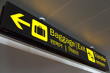 guide post in air port for baggage claim and information in new delhi airport