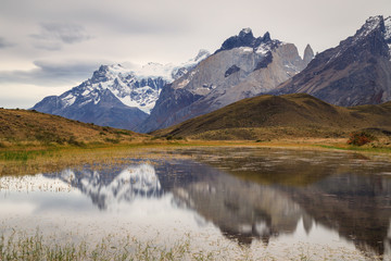 Torres del Paine mountain range reflecting in a lake