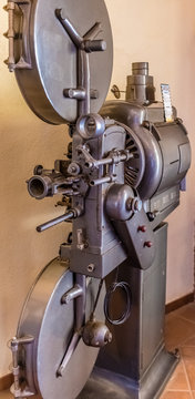 Old movie cinema film projector of 8mm and 16mm show old long lens .Vintage retro technology concept