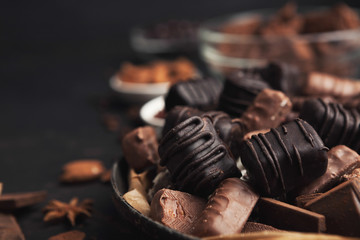 Variety of chocolate candies in old fashioned bowl