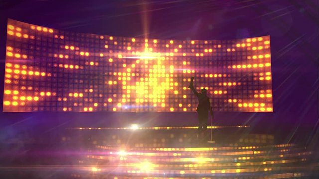 Male silhouette on stage in the light of soffits