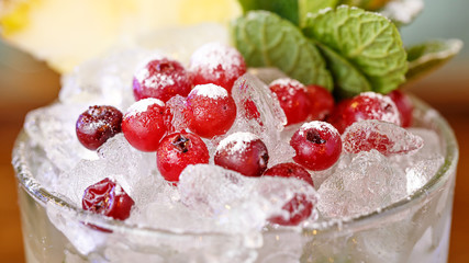 Cranberry on ice in a glass