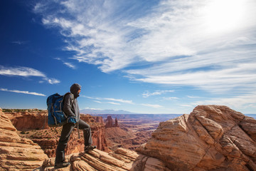 Fototapeta premium Hiker in Canyonlands National park in Utah, USA