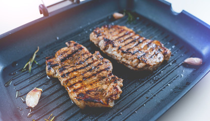 Two Grilled Steaks On a Grill Pan. Top View.