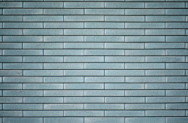 Facing brick blue green background