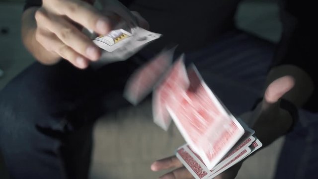 Manipulation With A Deck Of Cards. Shuffle Cards. The Magician Works With A Deck Of Cards. 4k