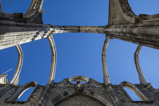  The ruins of the Carmo Church and Convent, destroyed in the earthquake 1755, amazing attraction in Lisbon, Portugal. © elephotos