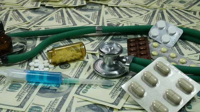 camera movement over medicaments and money