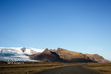 Road in Iceland in sunset light, autumn.