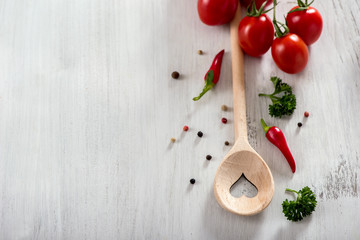 Cooking spoon and vegetables copy space food background, vegan or healthy cooking concept