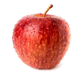 Red Apple in water drops on a white background, closeup.