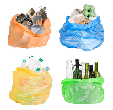 Open plastic bags with rubbish prepared for recycling