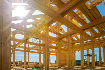 House made of laminated veneer lumber. The frame of the house. Construction of cottages. Under...