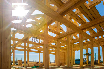 House made of laminated veneer lumber. The frame of the house. Construction of cottages. Under construction cottage.