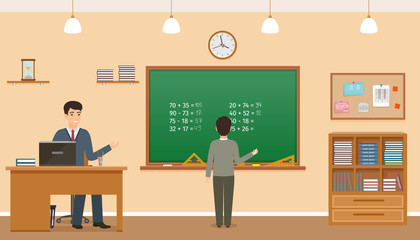 School classroom with chalkboard, clock and teacher's desk. Teacher sitting at the table and schoolboy staying near chalkboard