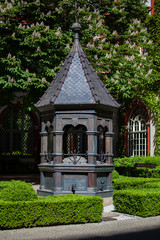 An ancient well in the garden in the city of Wroclaw