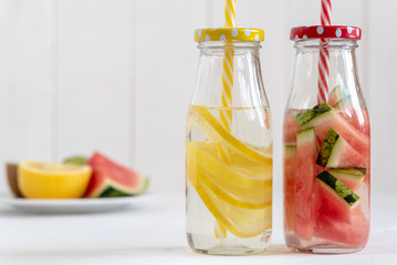 Fototapeta na wymiar Refreshing summer homemade lemonade. Detox fruit water.