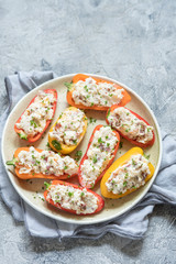 peppers stuffed with cheese, bacon and herbs