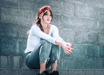 girl in jeans and a white T-shirt