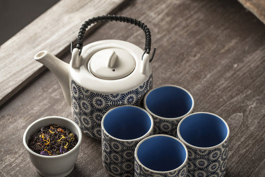 White And Blue Tea Set On Wooden Table